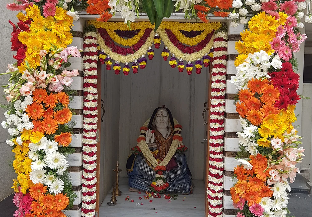 Shrine of Shri Sai Baba adorned with flowers